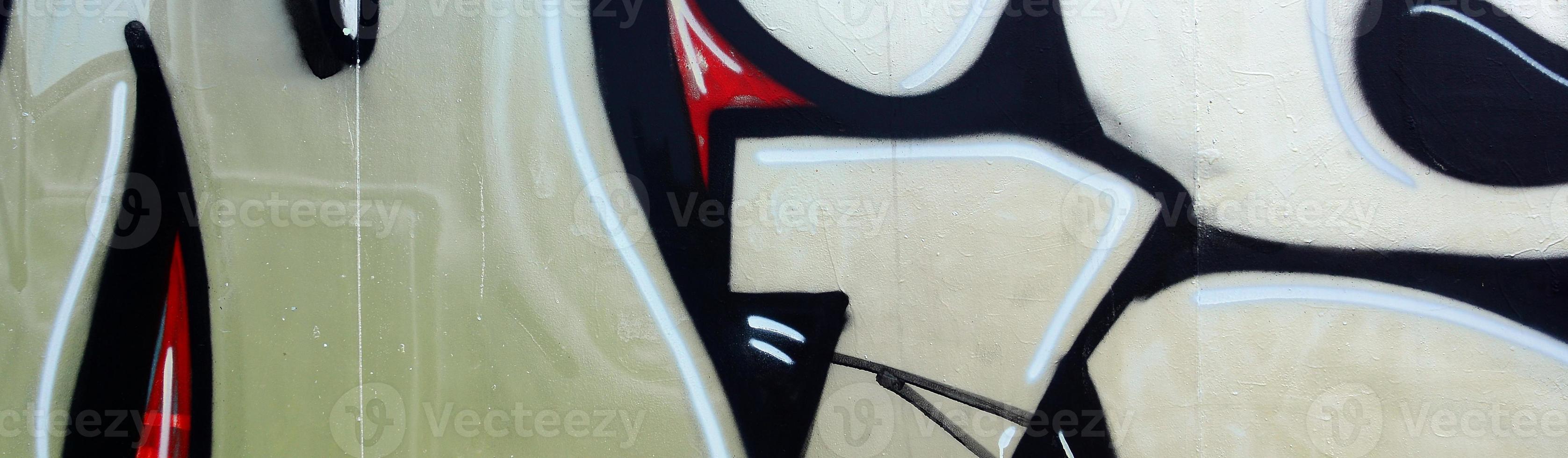 Street art. Abstract background image of a fragment of a colored graffiti painting in chrome and red tones photo