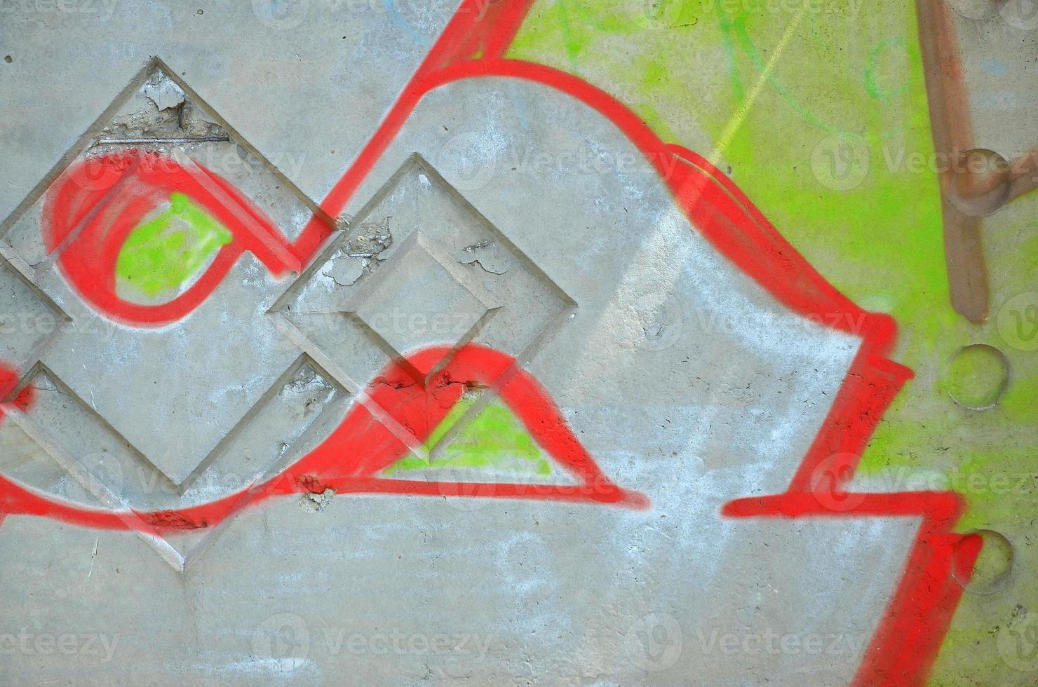 Texture of a fragment of the wall with graffiti painting, which is depicted on it. An image of a piece of graffiti drawing as a photo on street art and graffiti culture topics