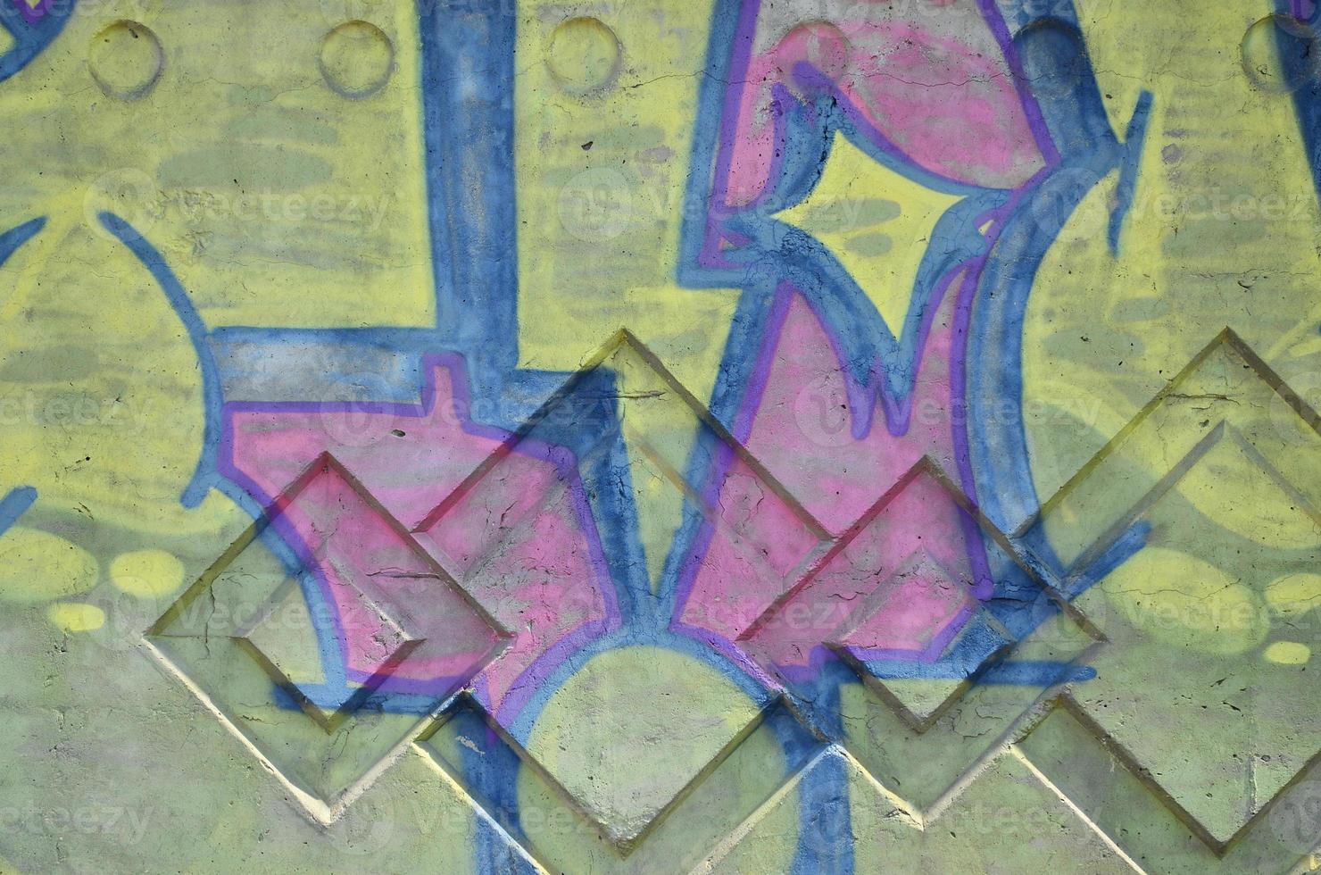 Texture of a fragment of the wall with graffiti painting, which is depicted on it. An image of a piece of graffiti drawing as a photo on street art and graffiti culture topics