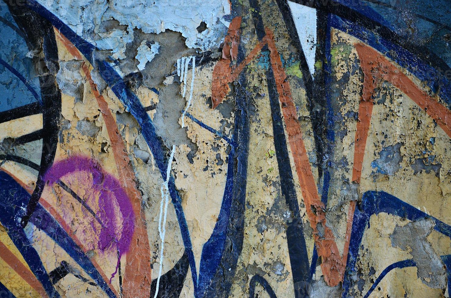 Detailed image of very old and aged color graffiti drawing on the wall. Background grunge street art picture photo