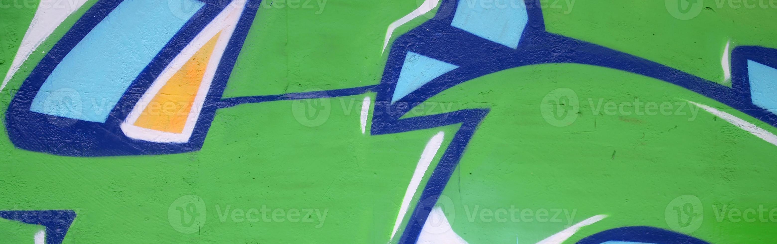 Fragment of colored street art graffiti paintings with contours and shading close up photo