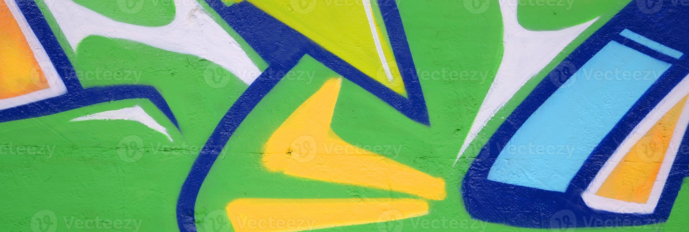 Fragment of colored street art graffiti paintings with contours and shading close up photo