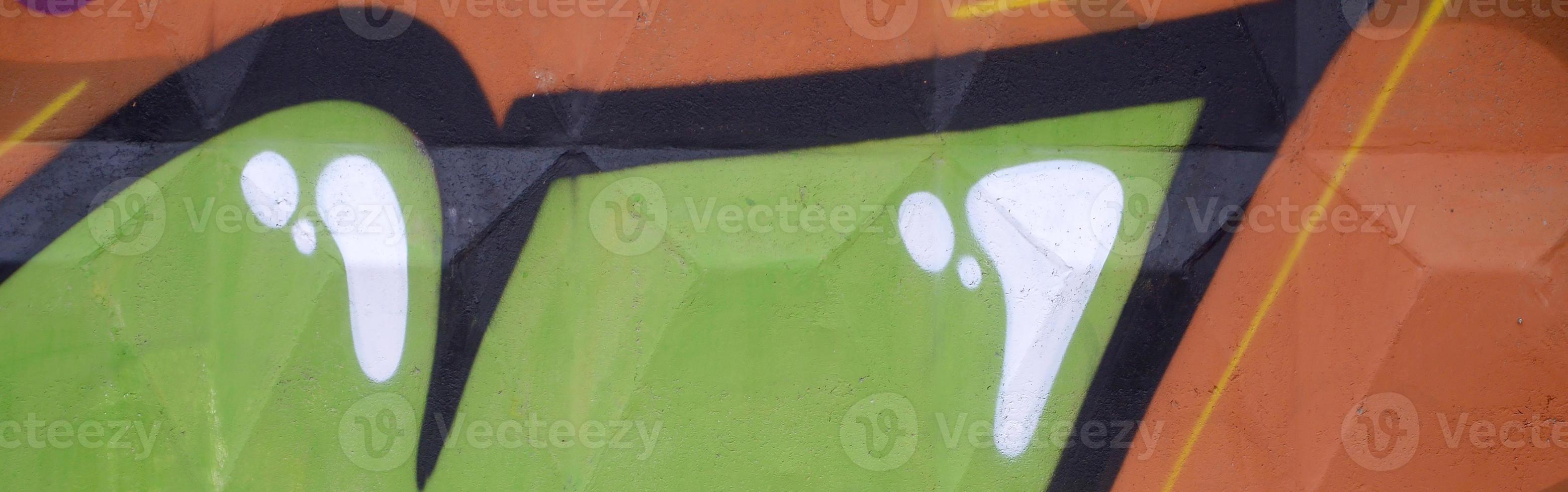 Fragment of colored street art graffiti paintings with contours and shading close up photo