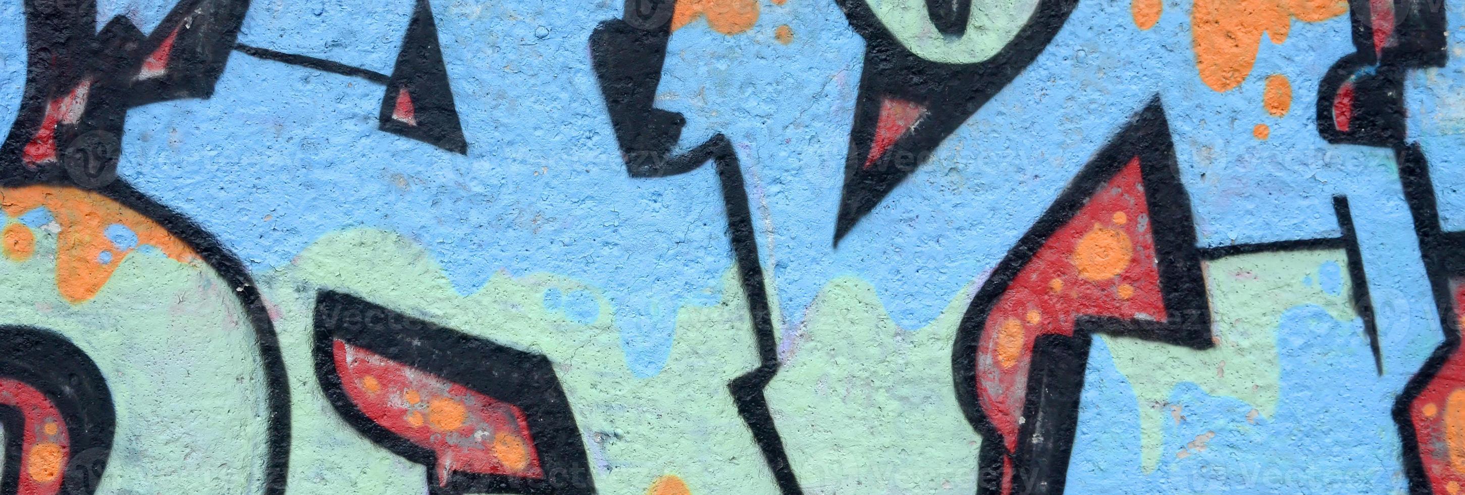 Fragment of colored street art graffiti paintings with contours and shading close up photo