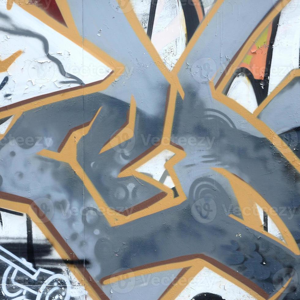 Fragment of colored street art graffiti paintings with contours and shading close up photo