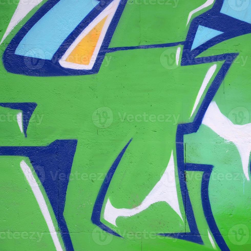 Fragment of colored street art graffiti paintings with contours and shading close up photo