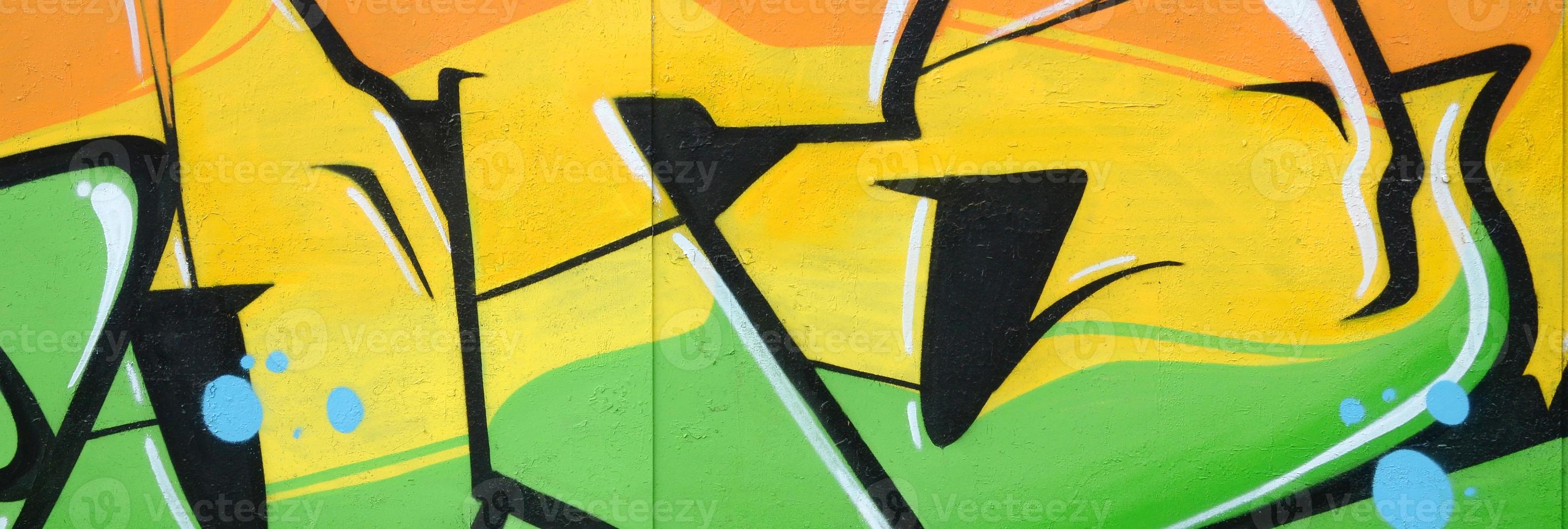 Fragment of colored street art graffiti paintings with contours and shading close up photo