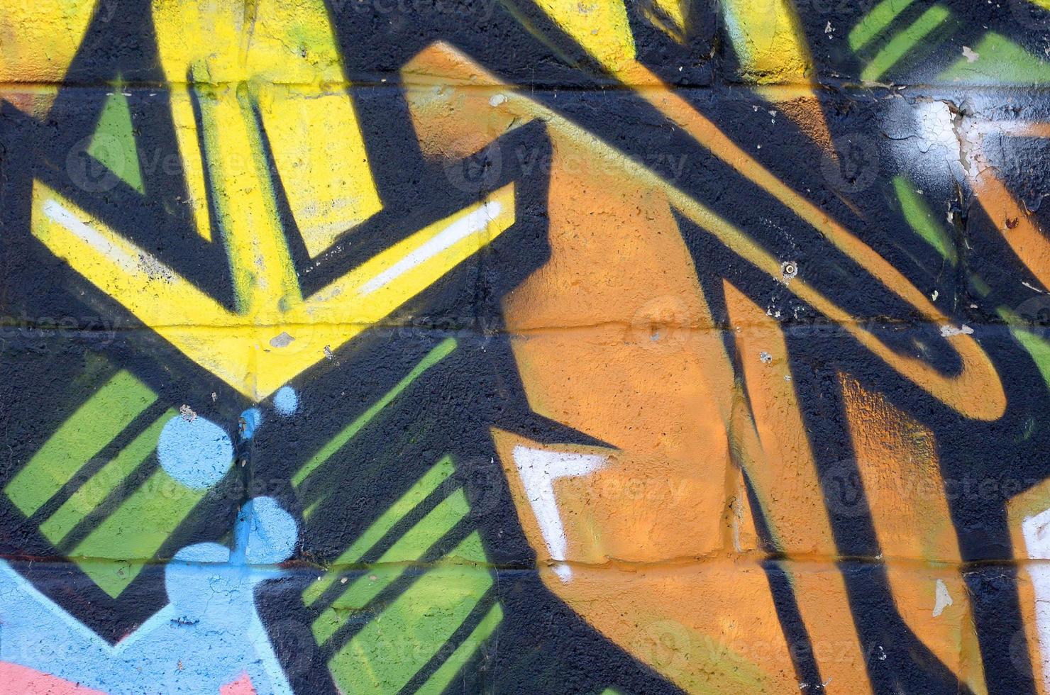 Fragment of colored street art graffiti paintings with contours and shading close up photo