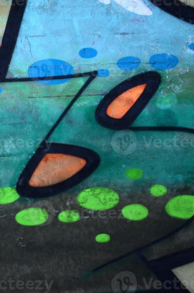 Fragment of colored street art graffiti paintings with contours and shading close up photo