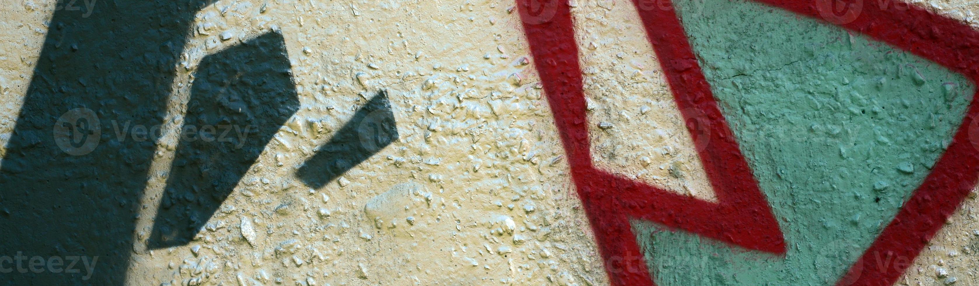 Street art. Abstract background image of a fragment of a colored graffiti painting in chrome and red tones photo