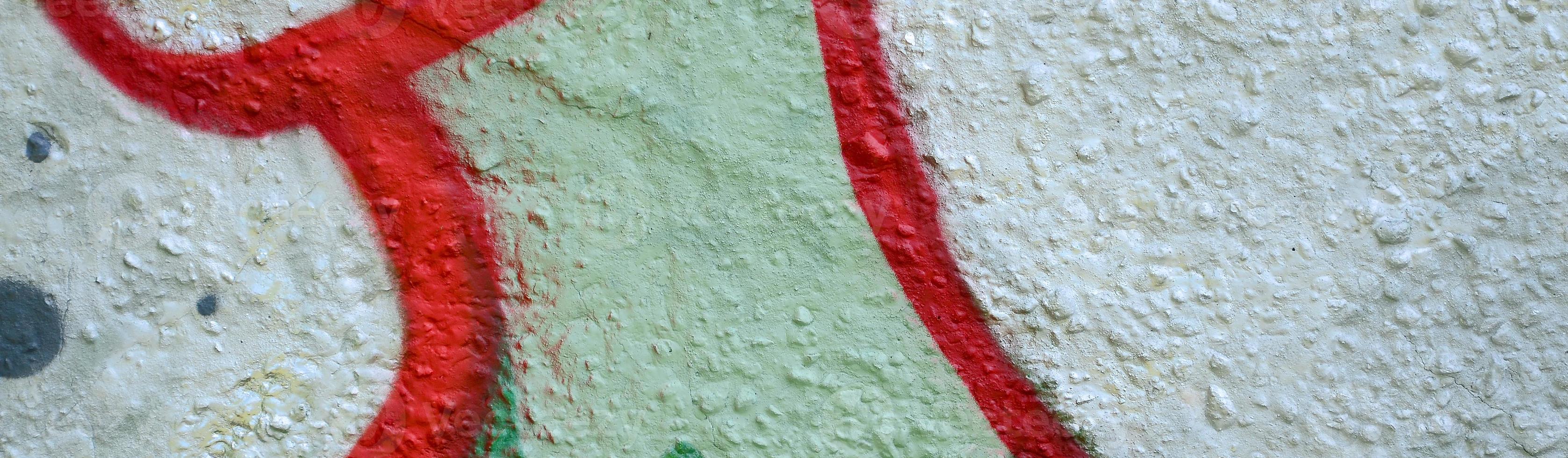 Street art. Abstract background image of a fragment of a colored graffiti painting in chrome and red tones photo