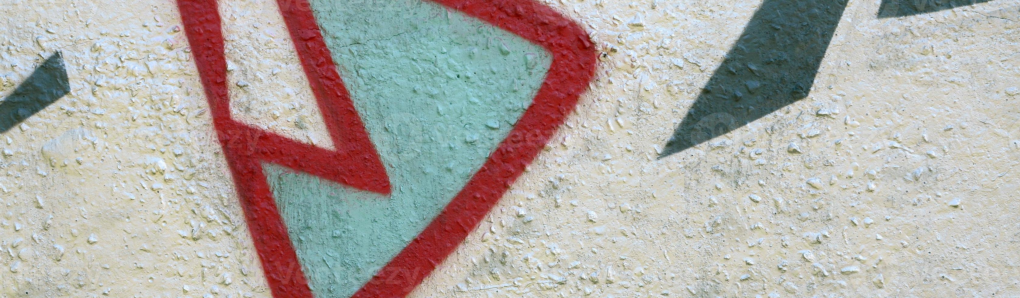 Street art. Abstract background image of a fragment of a colored graffiti painting in chrome and red tones photo