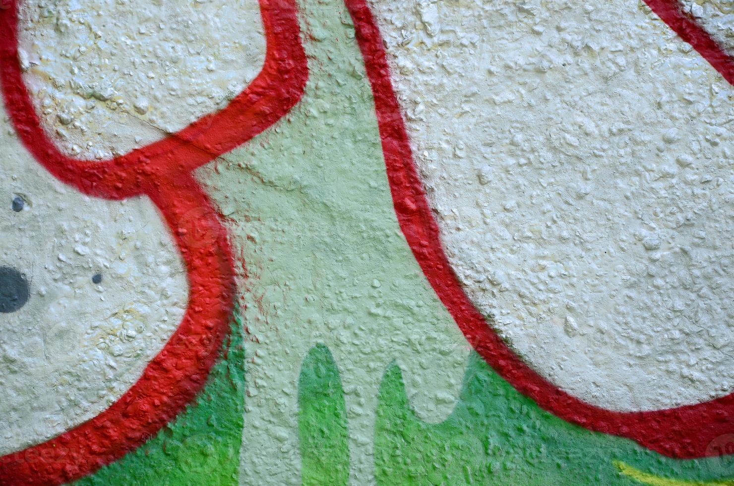 Street art. Abstract background image of a fragment of a colored graffiti painting in chrome and red tones photo