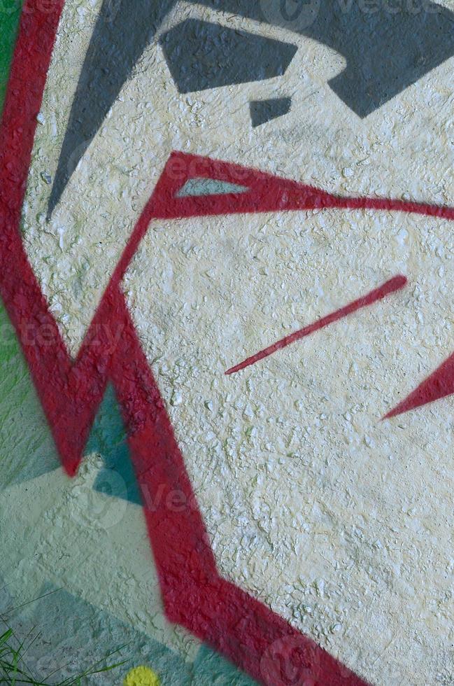 Street art. Abstract background image of a fragment of a colored graffiti painting in chrome and red tones photo