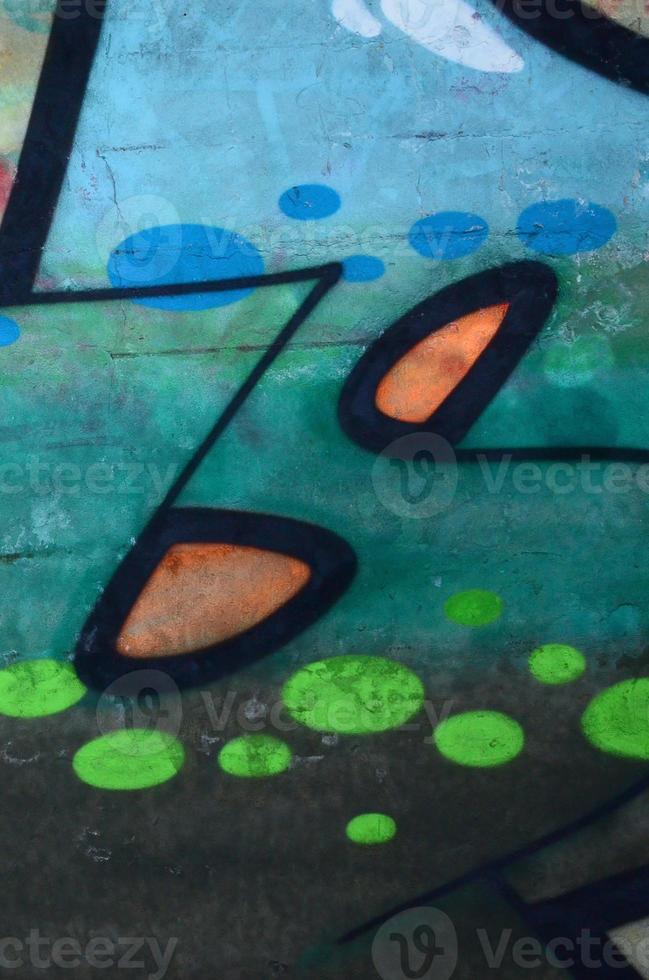 Fragment of colored street art graffiti paintings with contours and shading close up photo