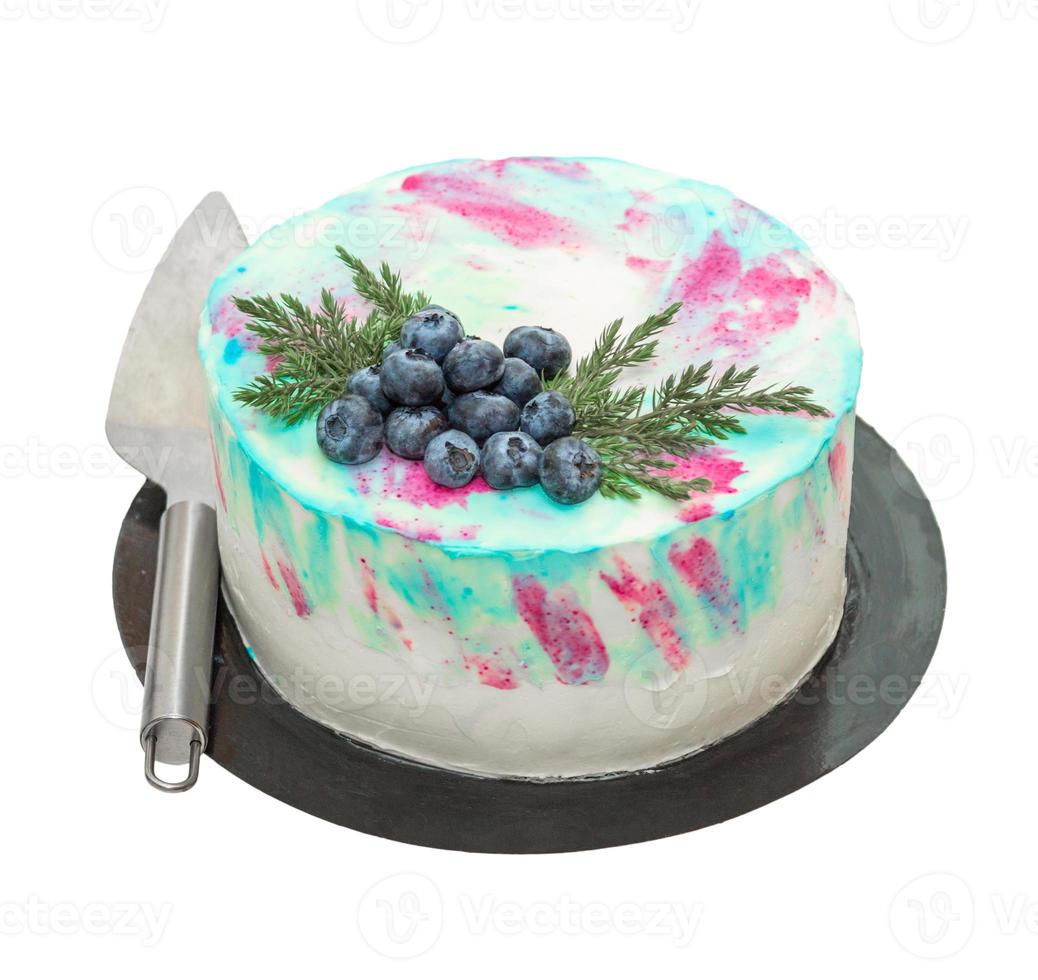 Cake with cream cheese and fresh blueberries isolated photo