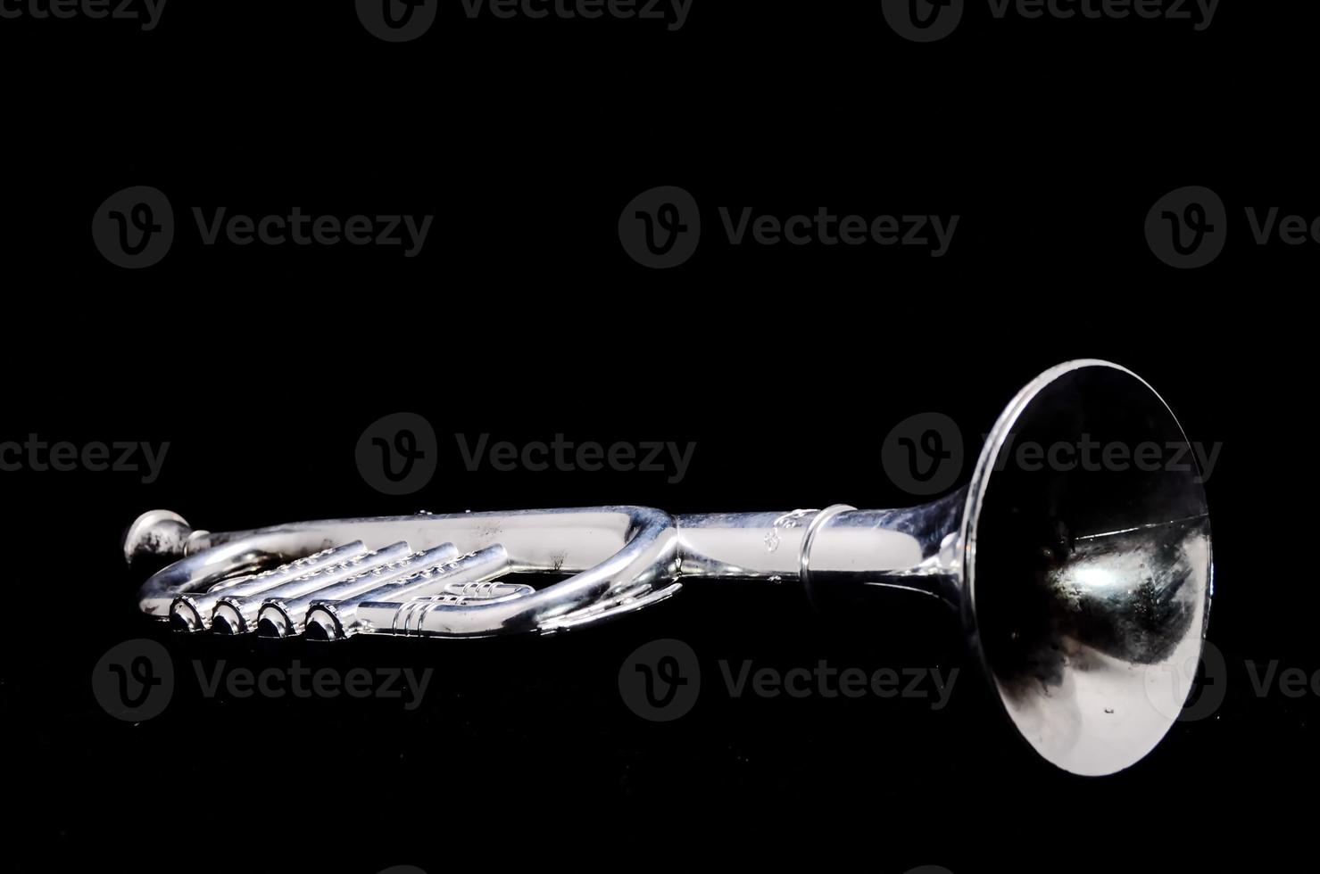 Trumpet on black background photo