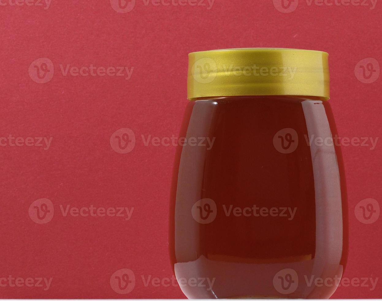 Isolated honey jar photo