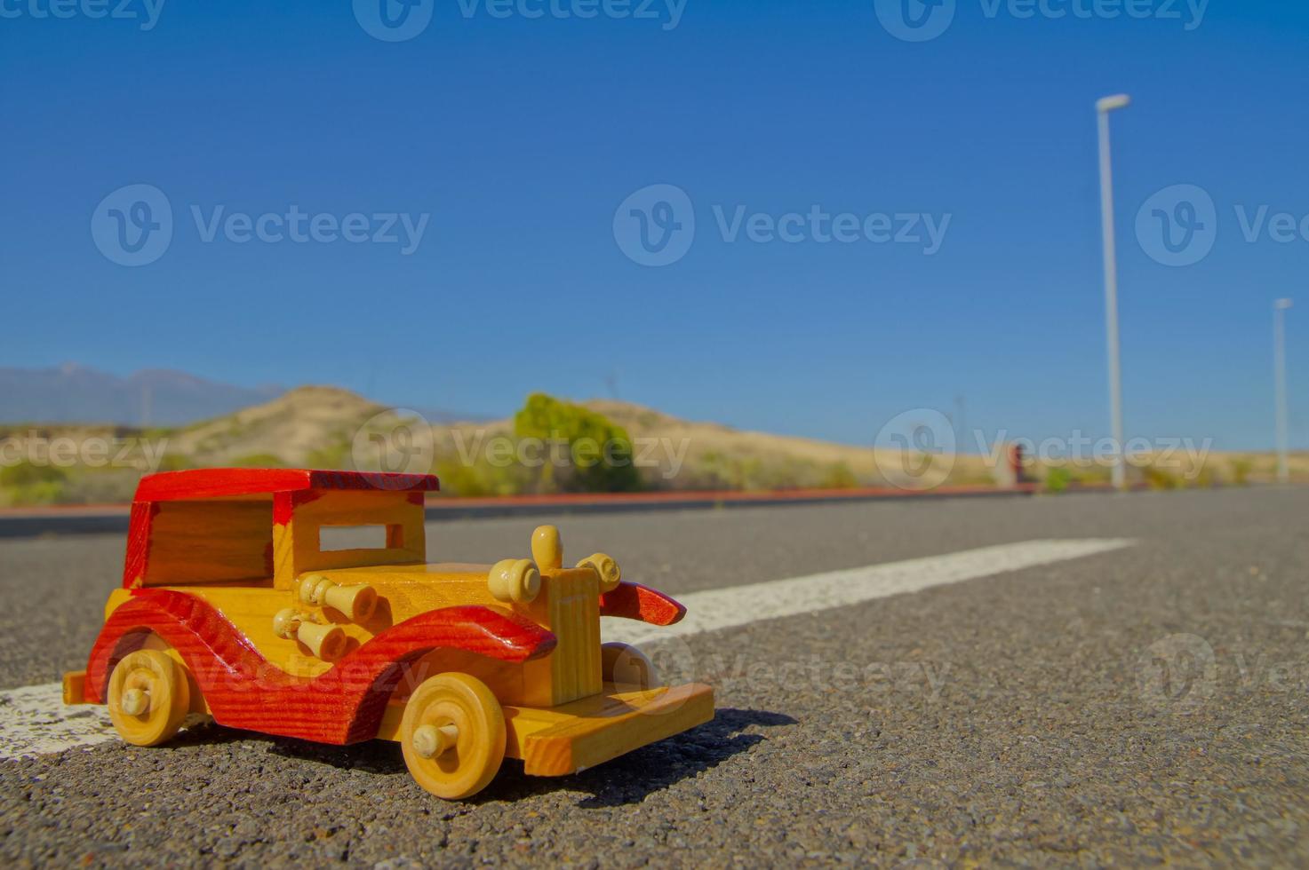Toy car on the road photo