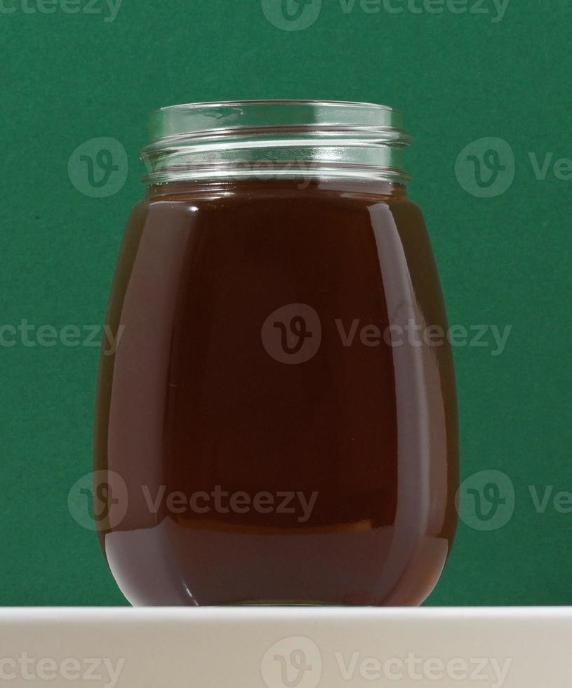 Isolated honey jar photo