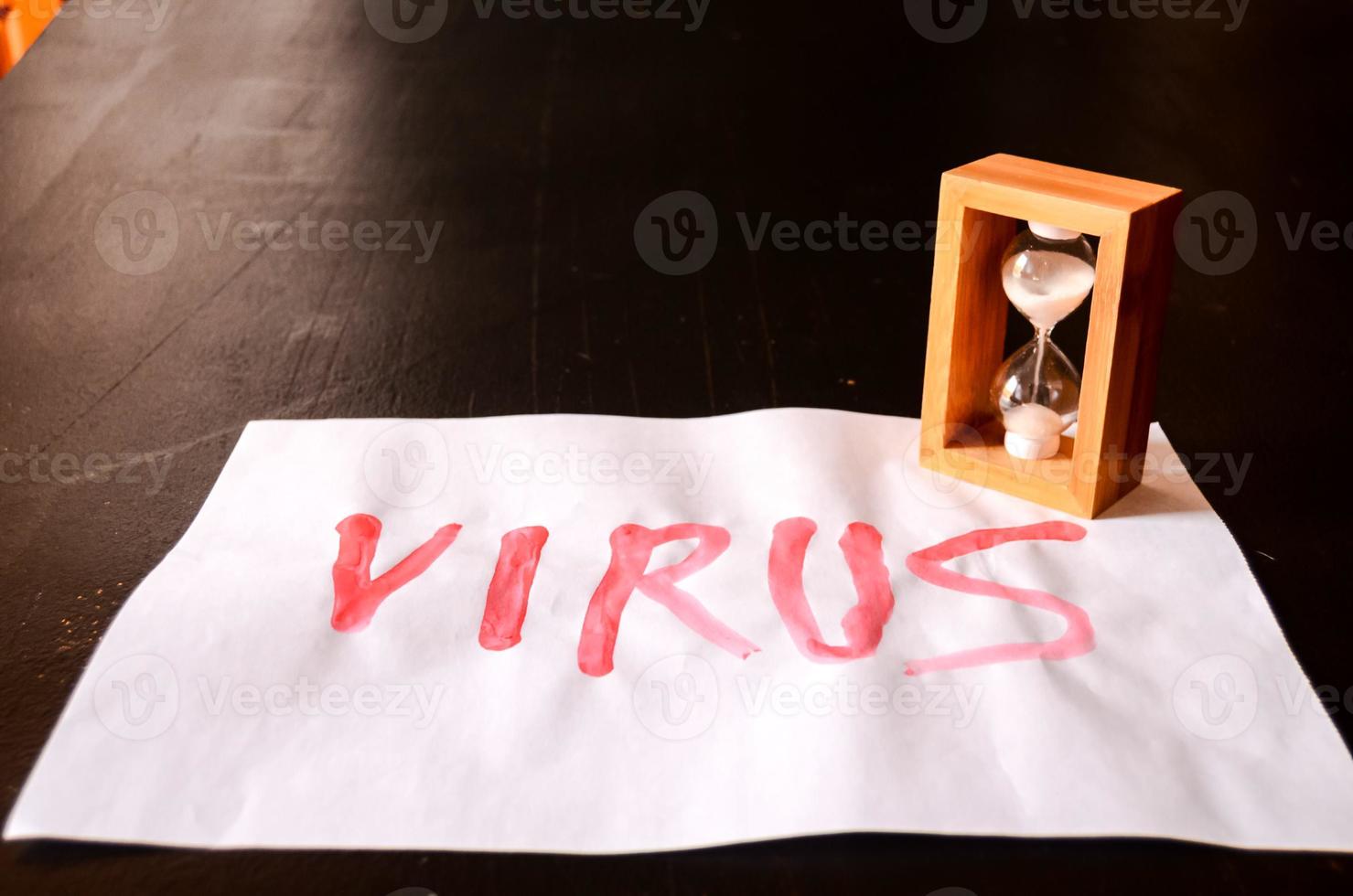 Virus written on paper photo