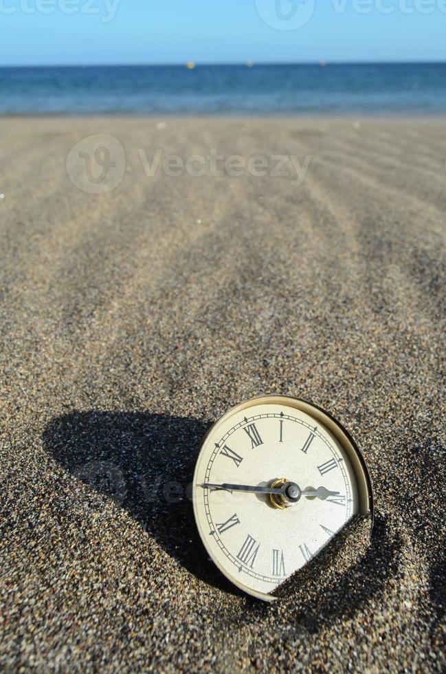 Clock on the ground photo