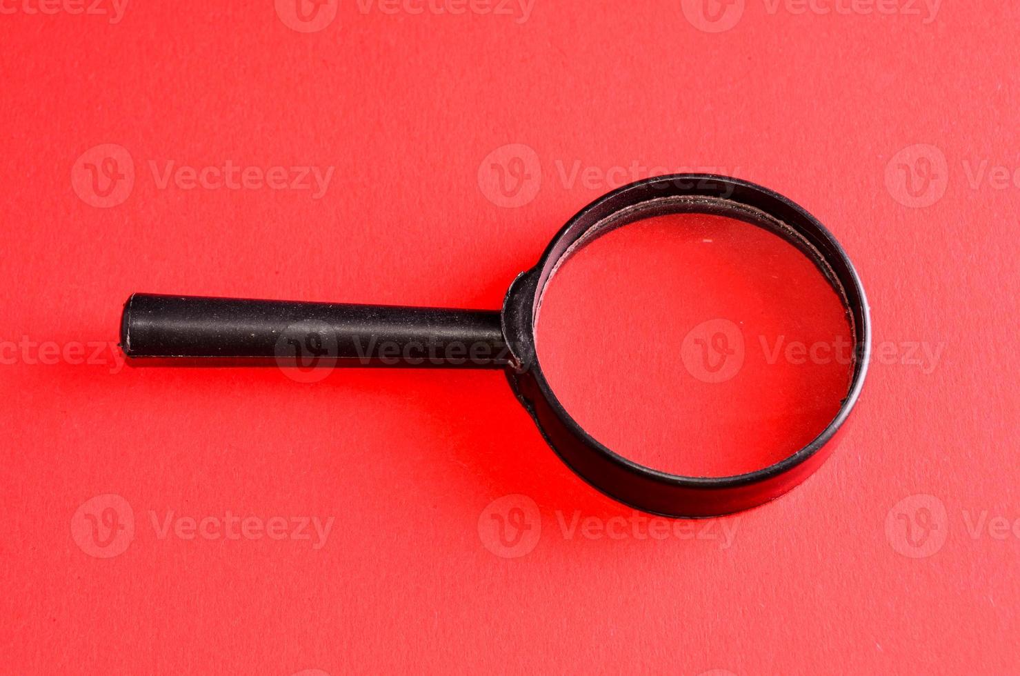 Isolated magnifying glass photo