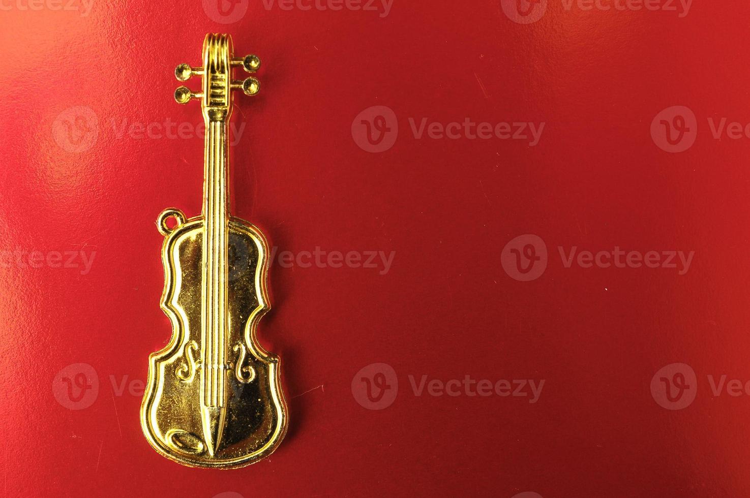 Gold violin miniature photo