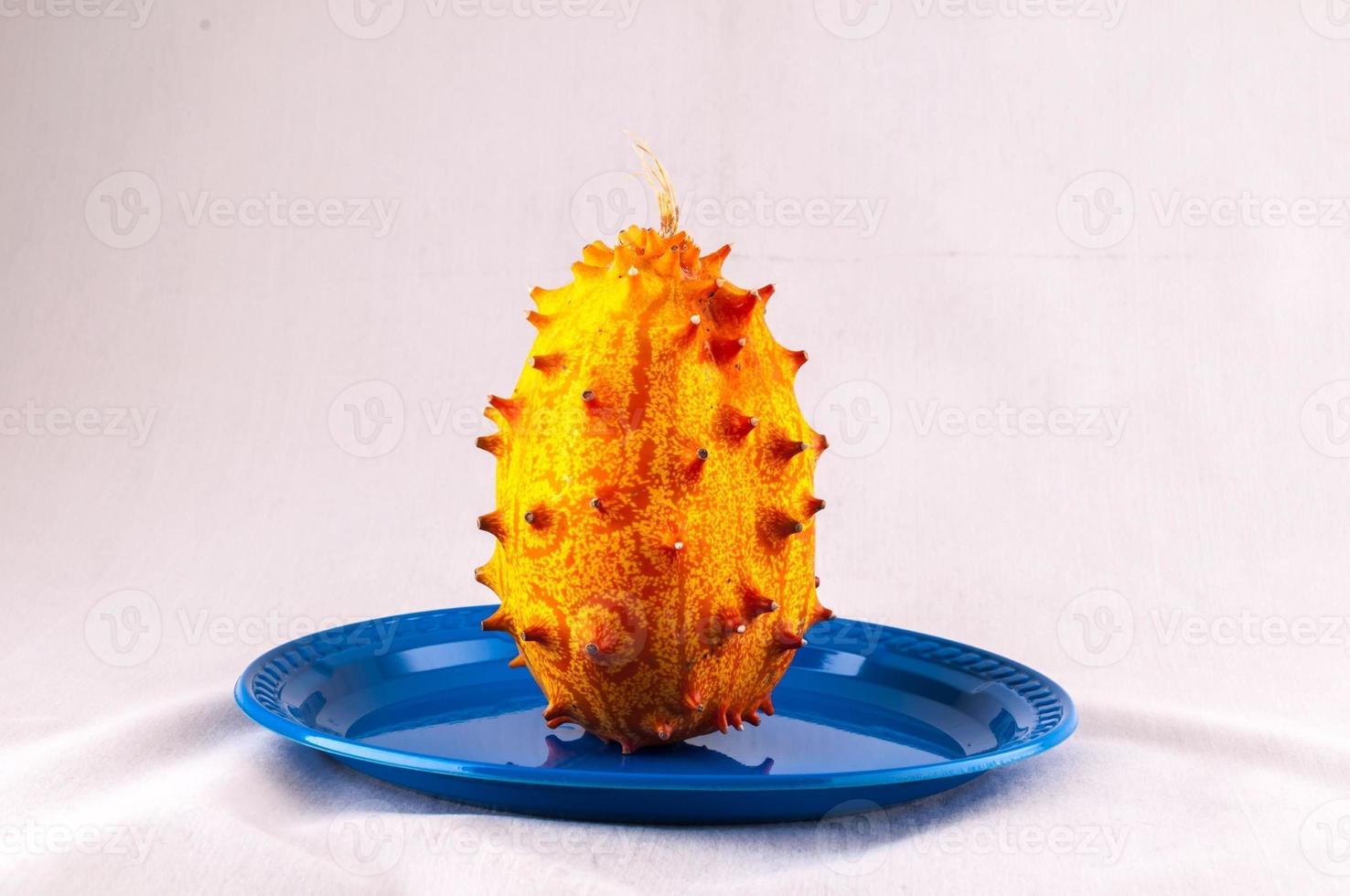 Isolated kiwano fruit on a plate photo