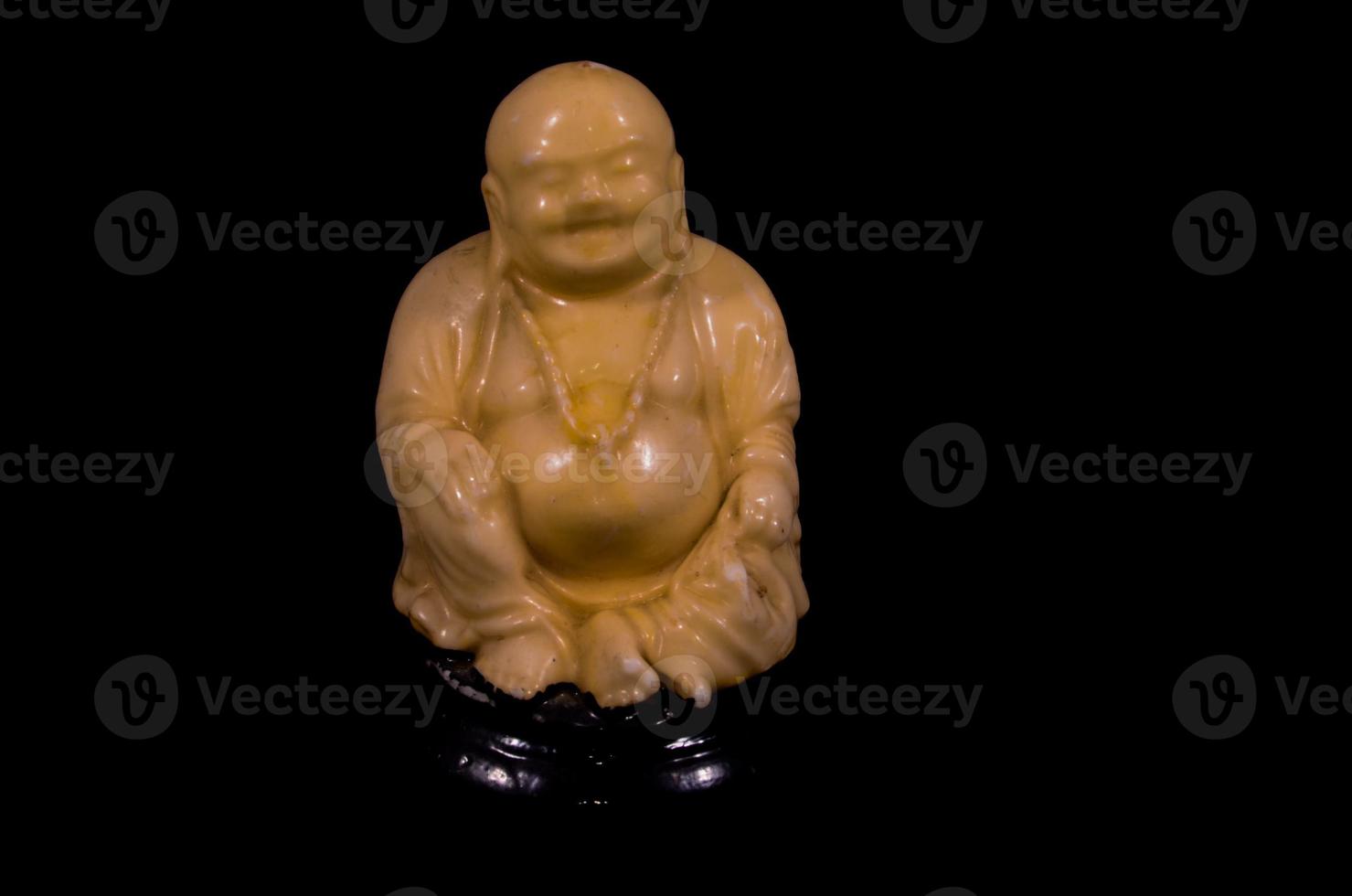 Buddha on black background photo