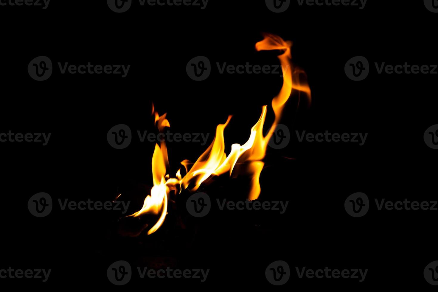 Fire flame texture. Burning material backdrop. Burn effect pattern. Blaze and torch wallpaper. Heat and haze backdrop. photo