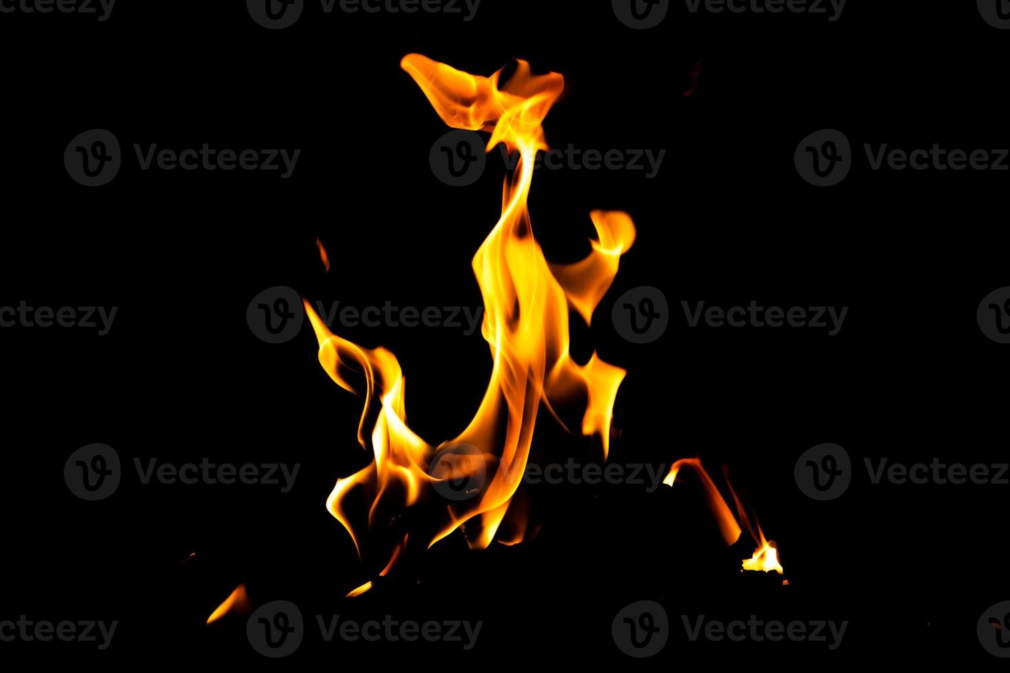 Fire flame texture. Burning material backdrop. Burn effect pattern. Blaze and torch wallpaper. Heat and haze backdrop. photo