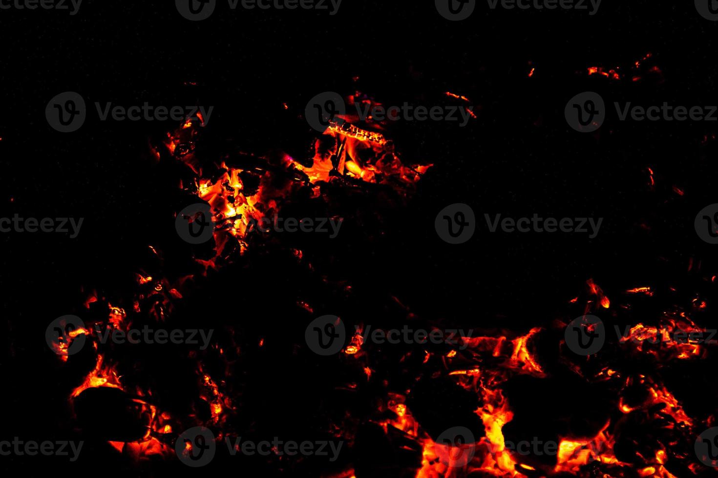 Fire flame texture. Burning material backdrop. Burn effect pattern. Blaze and torch wallpaper. Heat and haze backdrop. photo