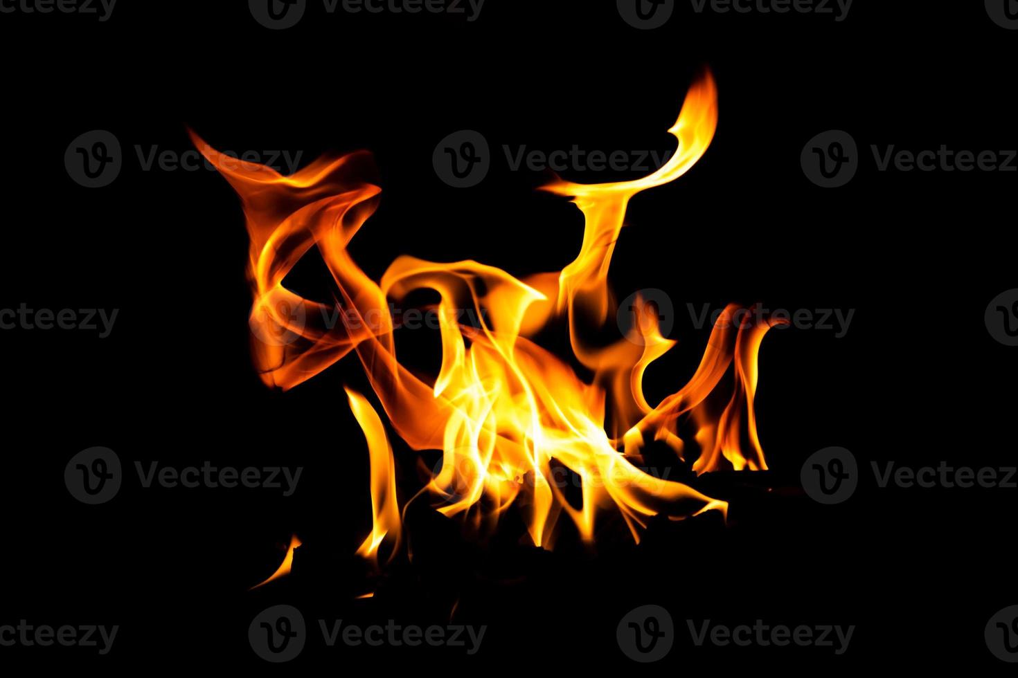 Fire flame texture. Burning material backdrop. Burn effect pattern. Blaze and torch wallpaper. Heat and haze backdrop. photo