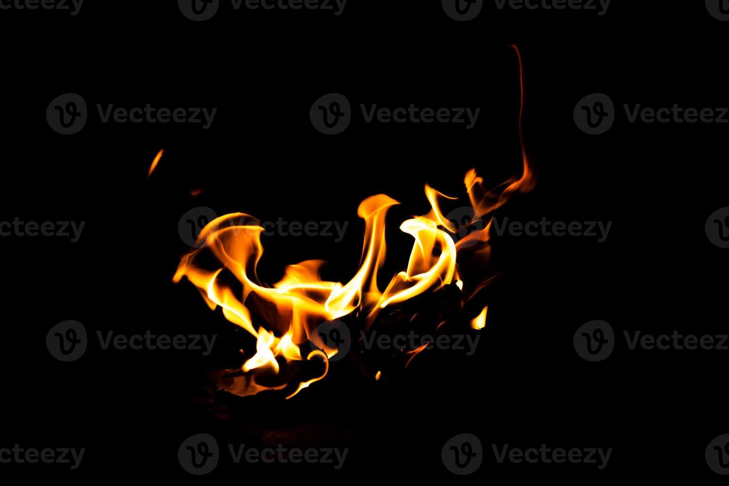 Fire flame texture. Burning material backdrop. Burn effect pattern. Blaze and torch wallpaper. Heat and haze backdrop. photo