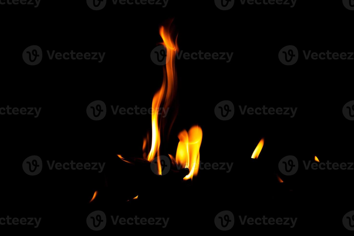 Fire flame texture. Burning material backdrop. Burn effect pattern. Blaze and torch wallpaper. Heat and haze backdrop. photo