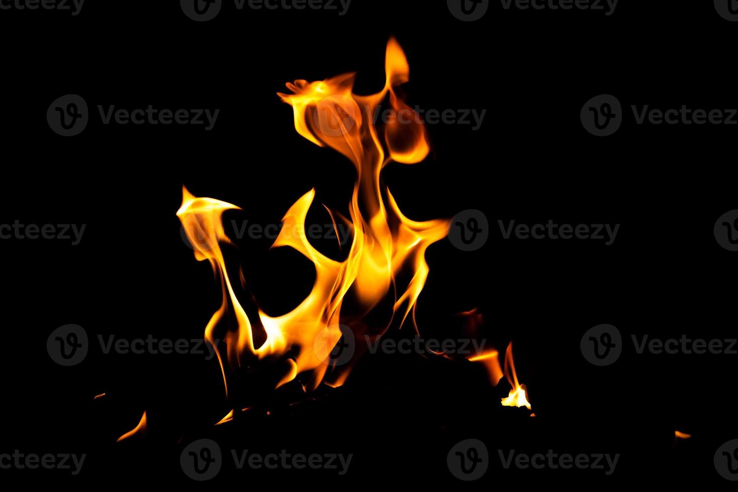 Fire flame texture. Burning material backdrop. Burn effect pattern. Blaze and torch wallpaper. Heat and haze backdrop. photo