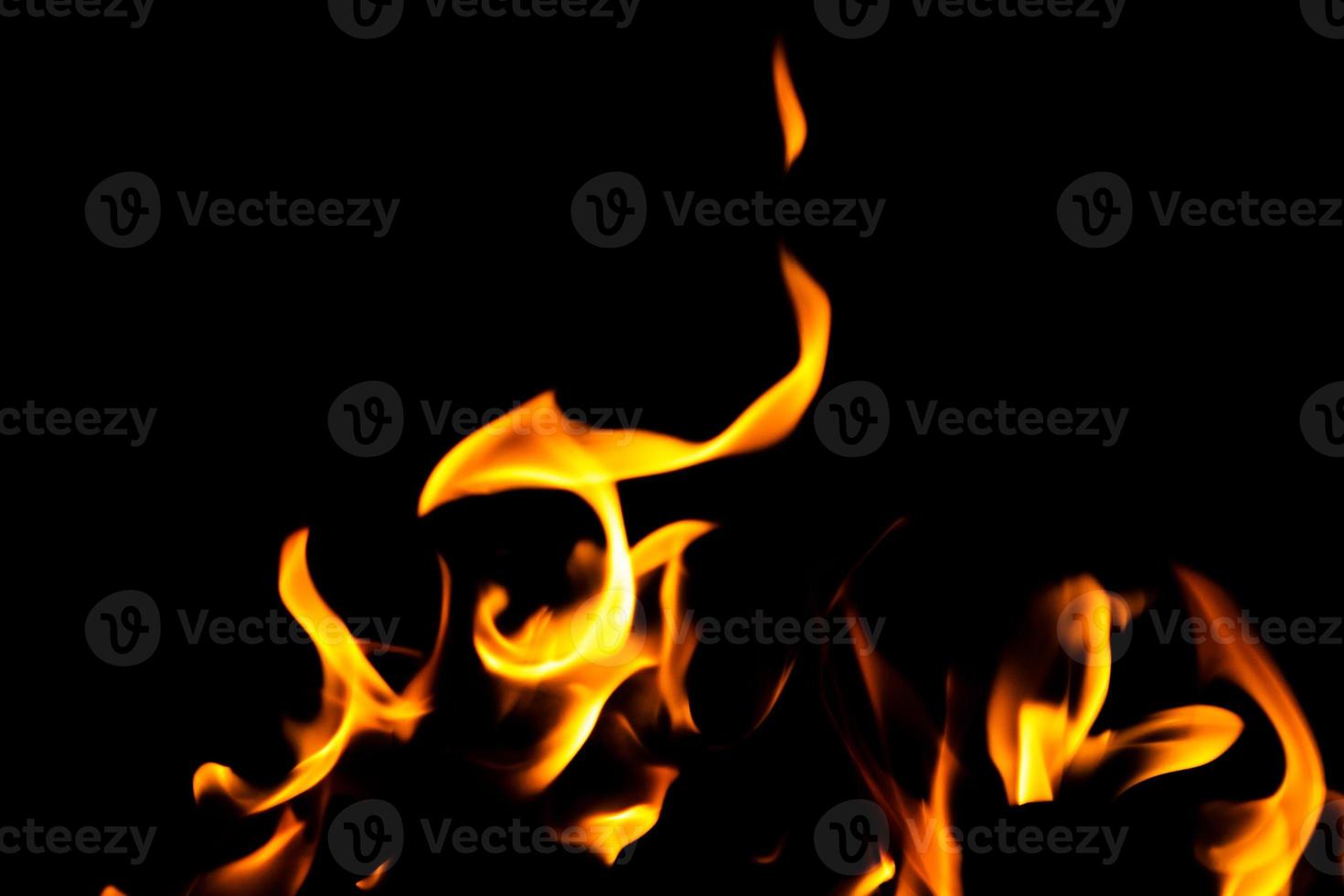 Fire flame texture. Burning material backdrop. Burn effect pattern. Blaze and torch wallpaper. Heat and haze backdrop. photo