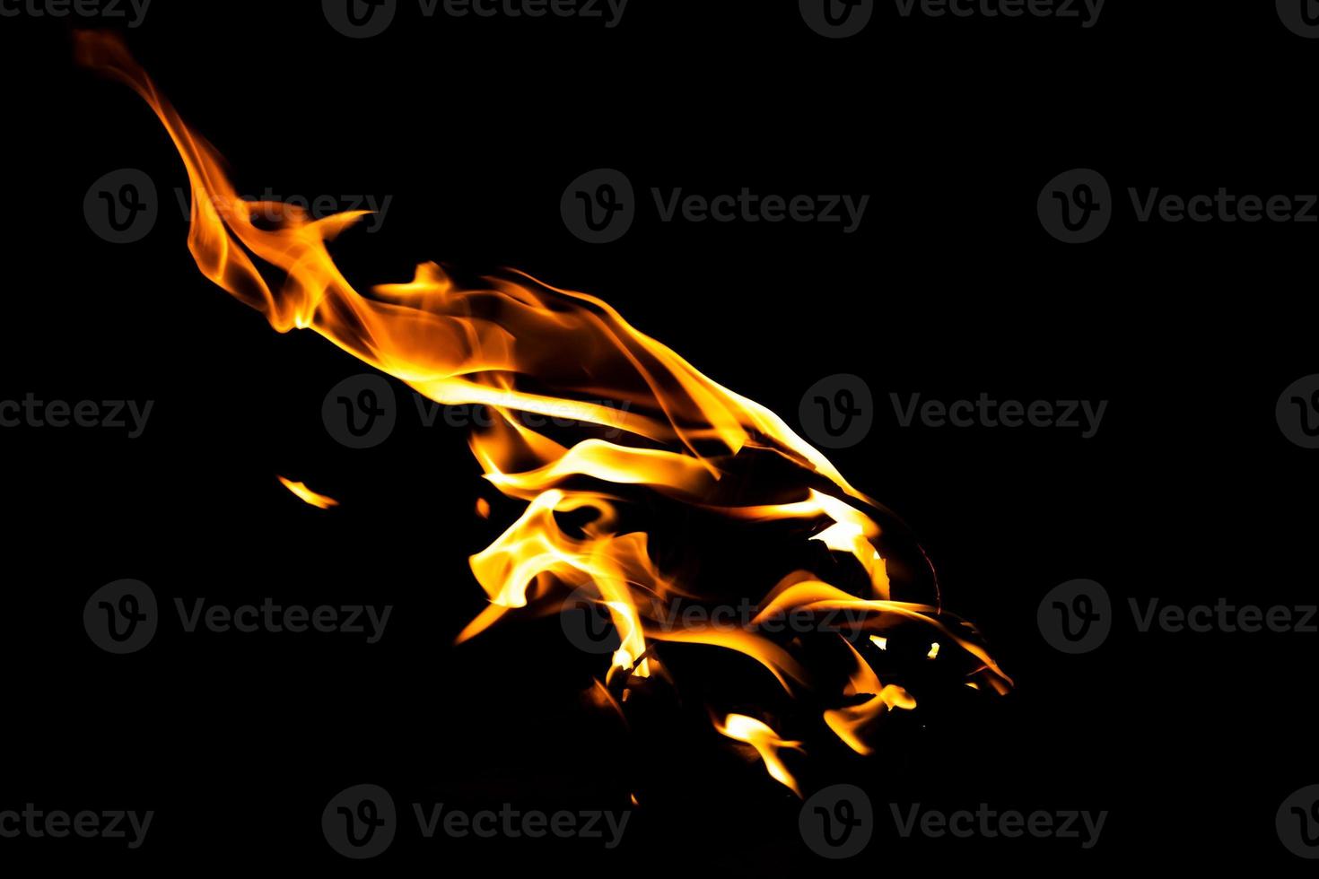 Fire flame texture. Burning material backdrop. Burn effect pattern. Blaze and torch wallpaper. Heat and haze backdrop. photo