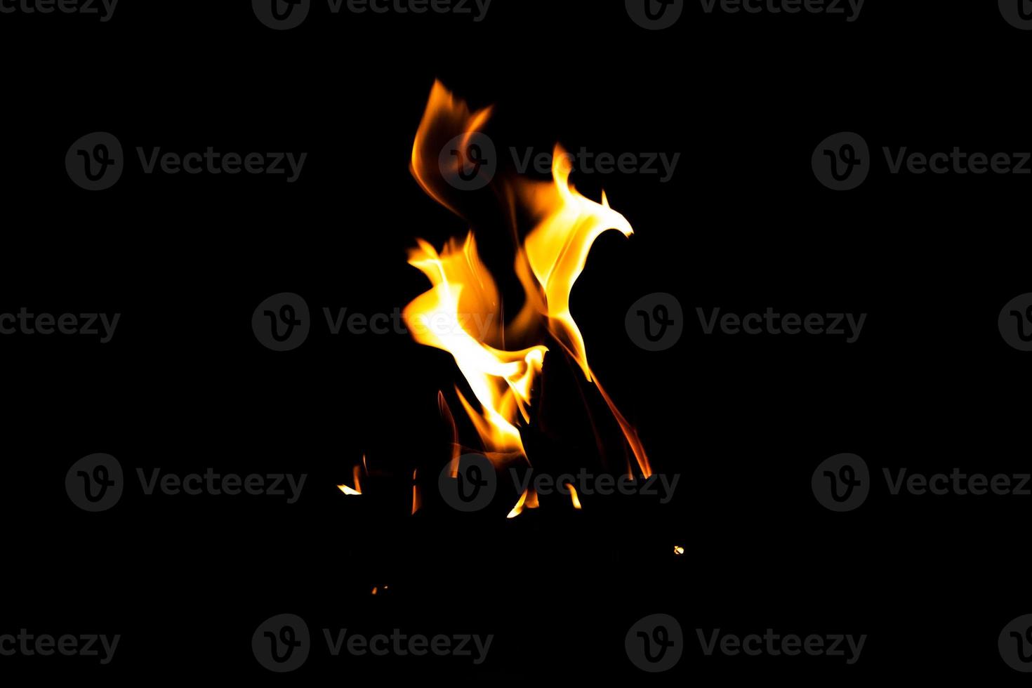 Fire flame texture. Burning material backdrop. Burn effect pattern. Blaze and torch wallpaper. Heat and haze backdrop. photo