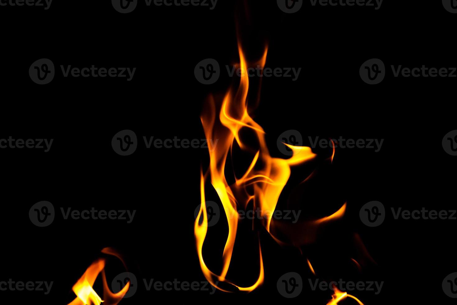 Fire flame texture. Burning material backdrop. Burn effect pattern. Blaze and torch wallpaper. Heat and haze backdrop. photo