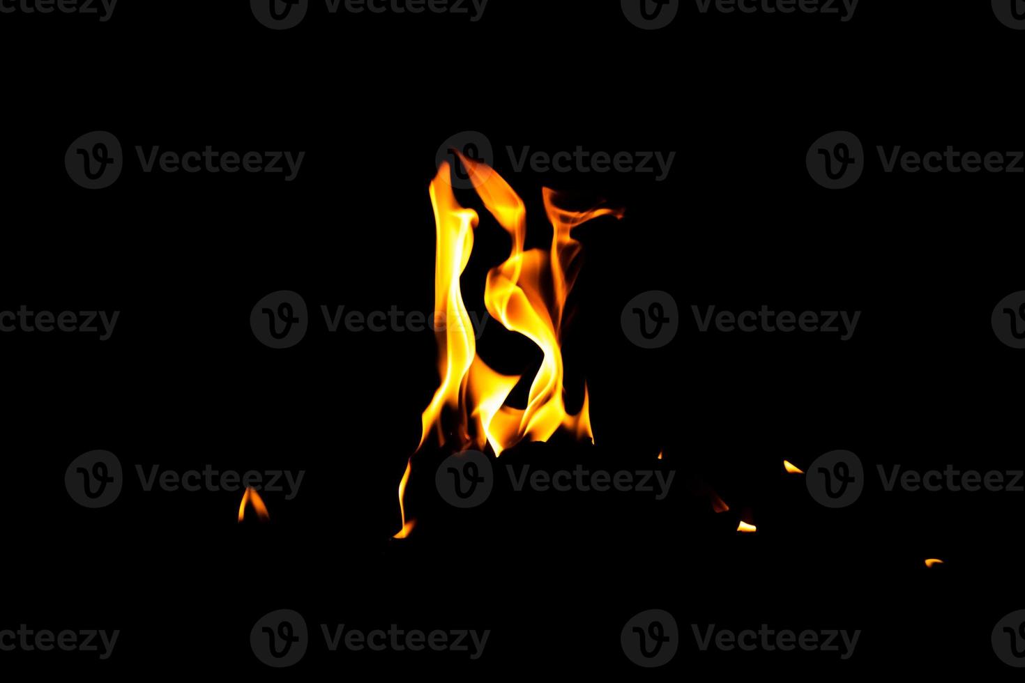Fire flame texture. Burning material backdrop. Burn effect pattern. Blaze and torch wallpaper. Heat and haze backdrop. photo
