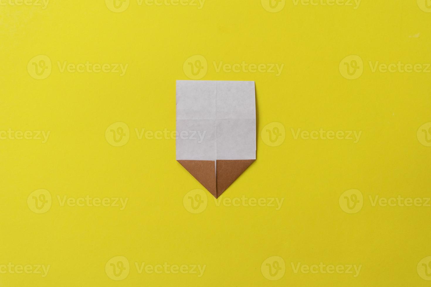 Step by step photo instruction how to make origami little ice cream. Simple diy with kids children's concept. Collage of the steps photo.