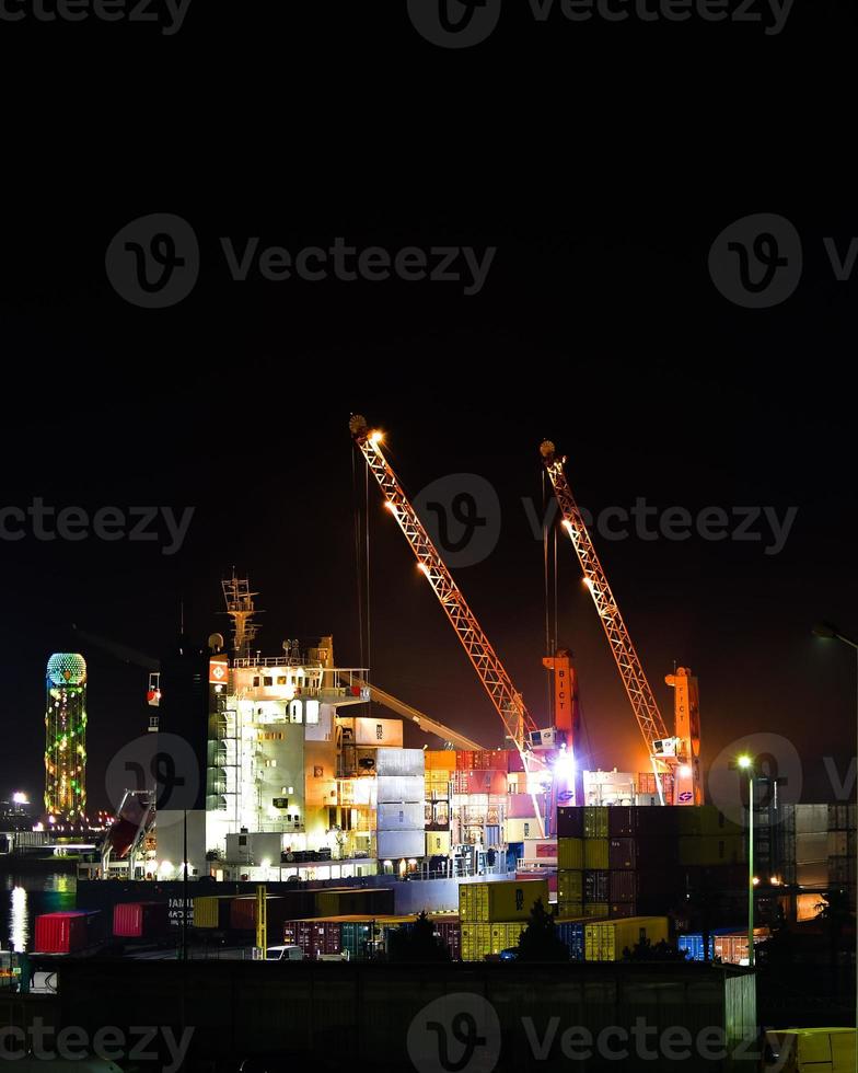 Batumi, Georgia, 2021 - transportation in Batumi Railway view with port panorama and waterfront promenade at night photo