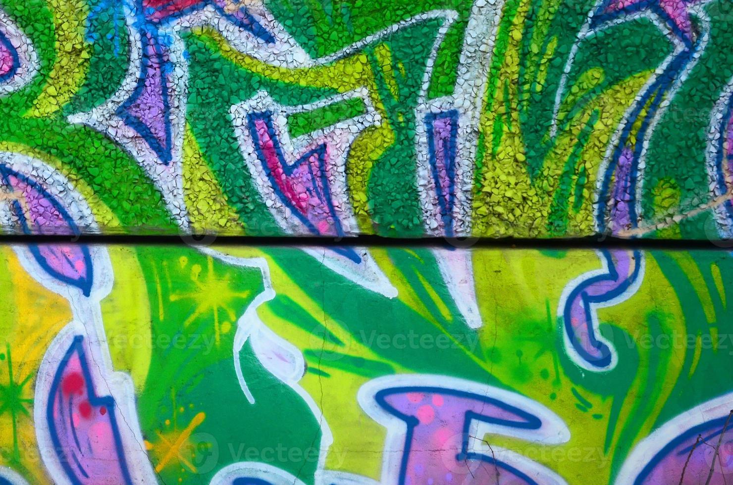 Fragment of colored street art graffiti paintings with contours and shading close up photo