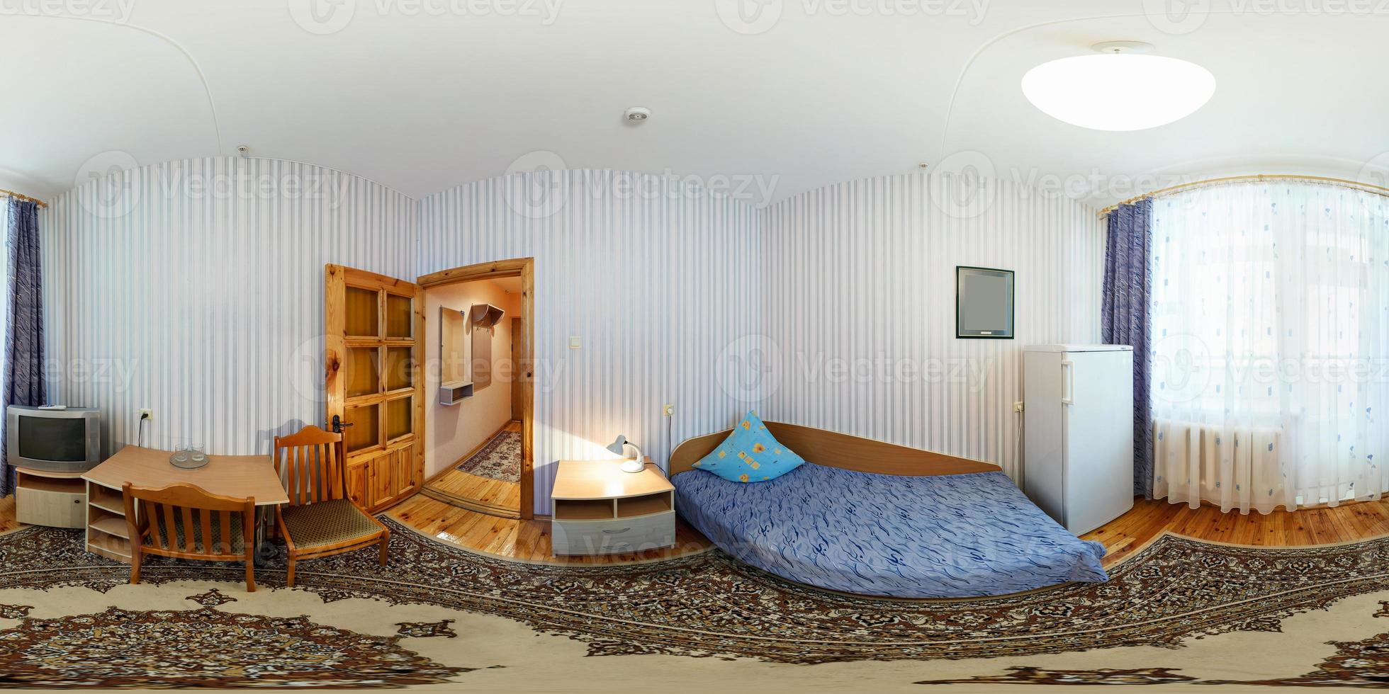 seamless 360 panorama in interior of bedroom of cheap hostel,  flat or apartments with chairs and table in equirectangular projection with zenith and nadir. VR AR content photo