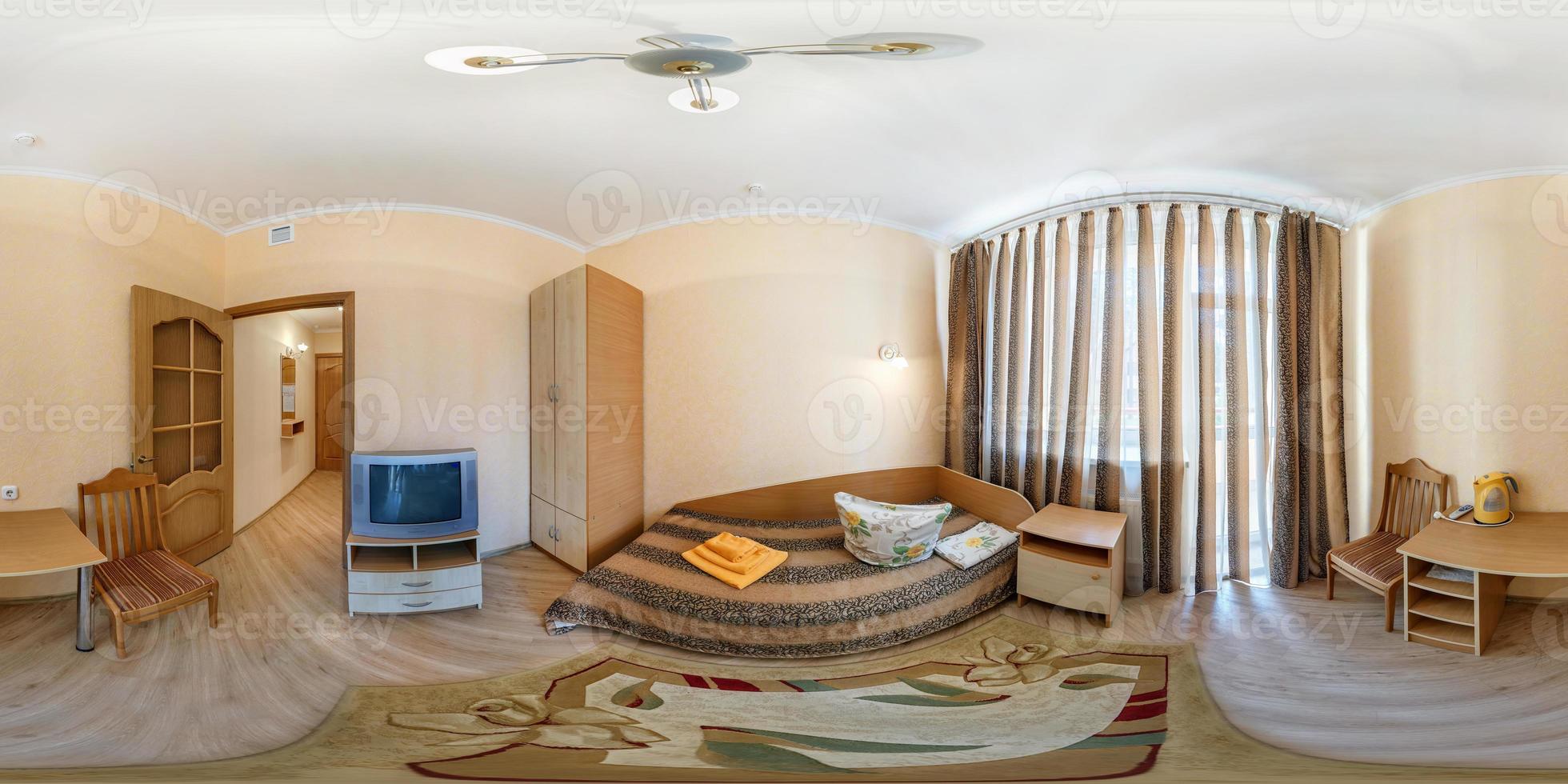 seamless 360 panorama in interior of bedroom of cheap hostel,  flat or apartments with chairs and table in equirectangular projection with zenith and nadir. VR AR content photo
