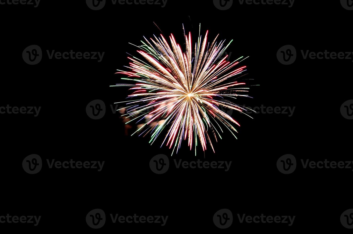 Celebratory big circle gold fireworks on a black background. Preparation for further work. Screen overlay. Bright and colorful illustration for design. photo