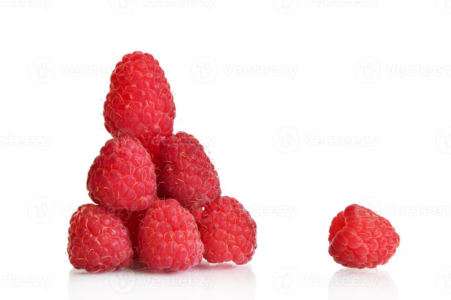 Ripe raspberries lined with a slide and one separate berry isolated on a white background. Element for design. Food clipart photo