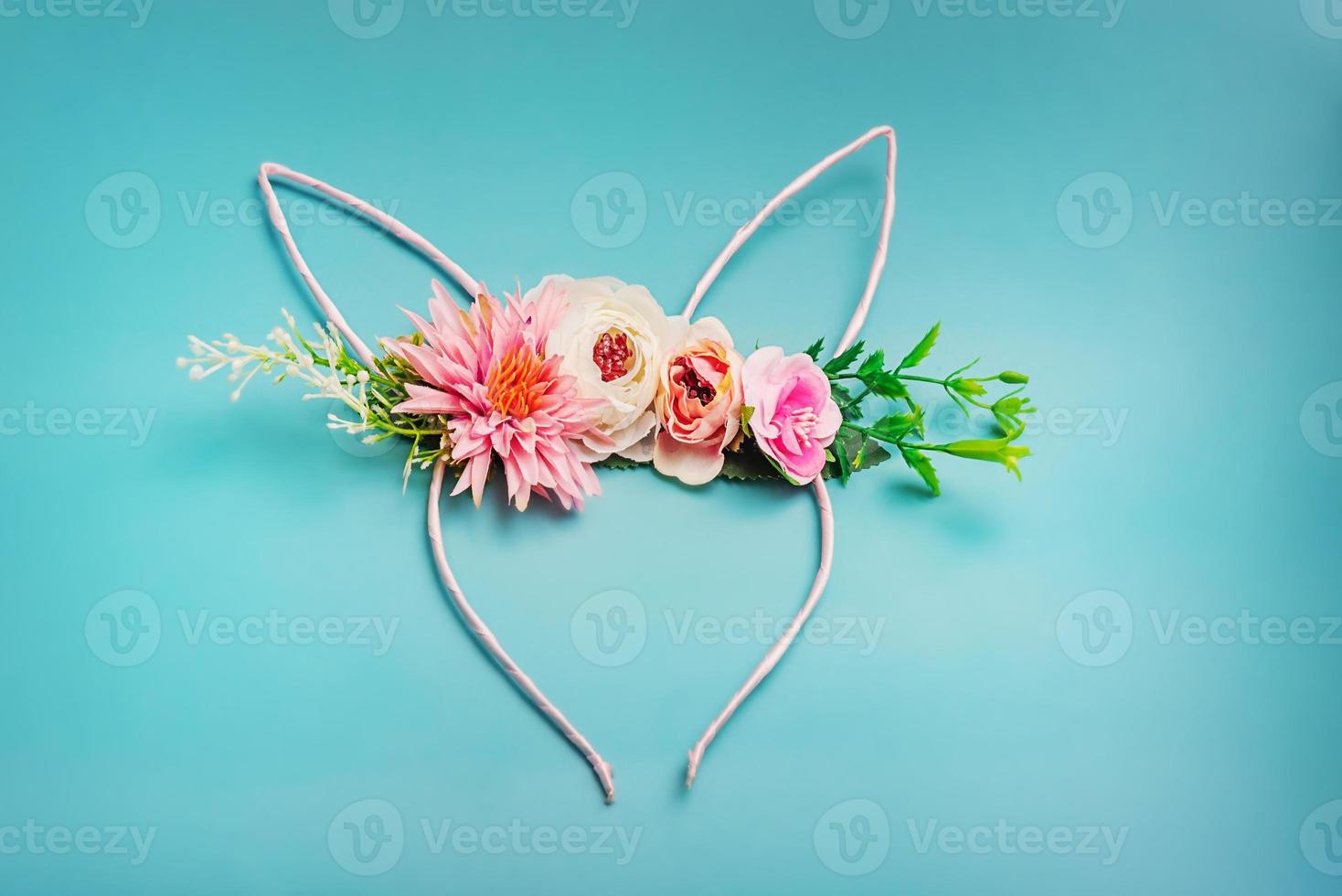 Rabbit ears as a hair decoration on Easter day. Decor, ornament for the Easter holiday. photo